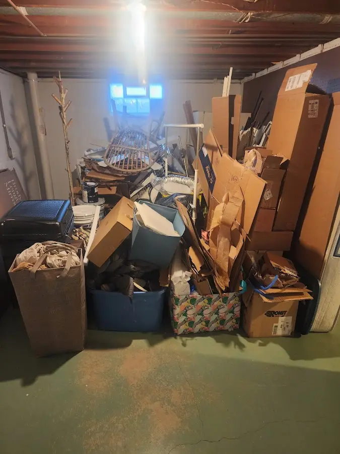 Roll-off dumpster container at job site for 8 Yard Dumpster Rental in Gray